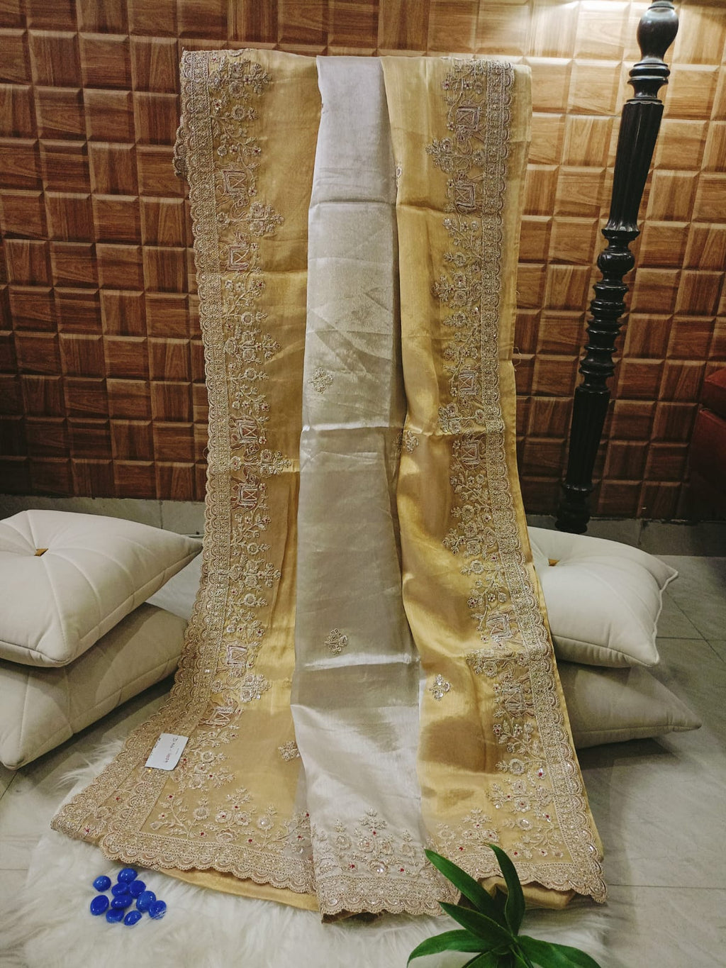 Gold Tissue Saree Featuring Intricate Hand Embellishment