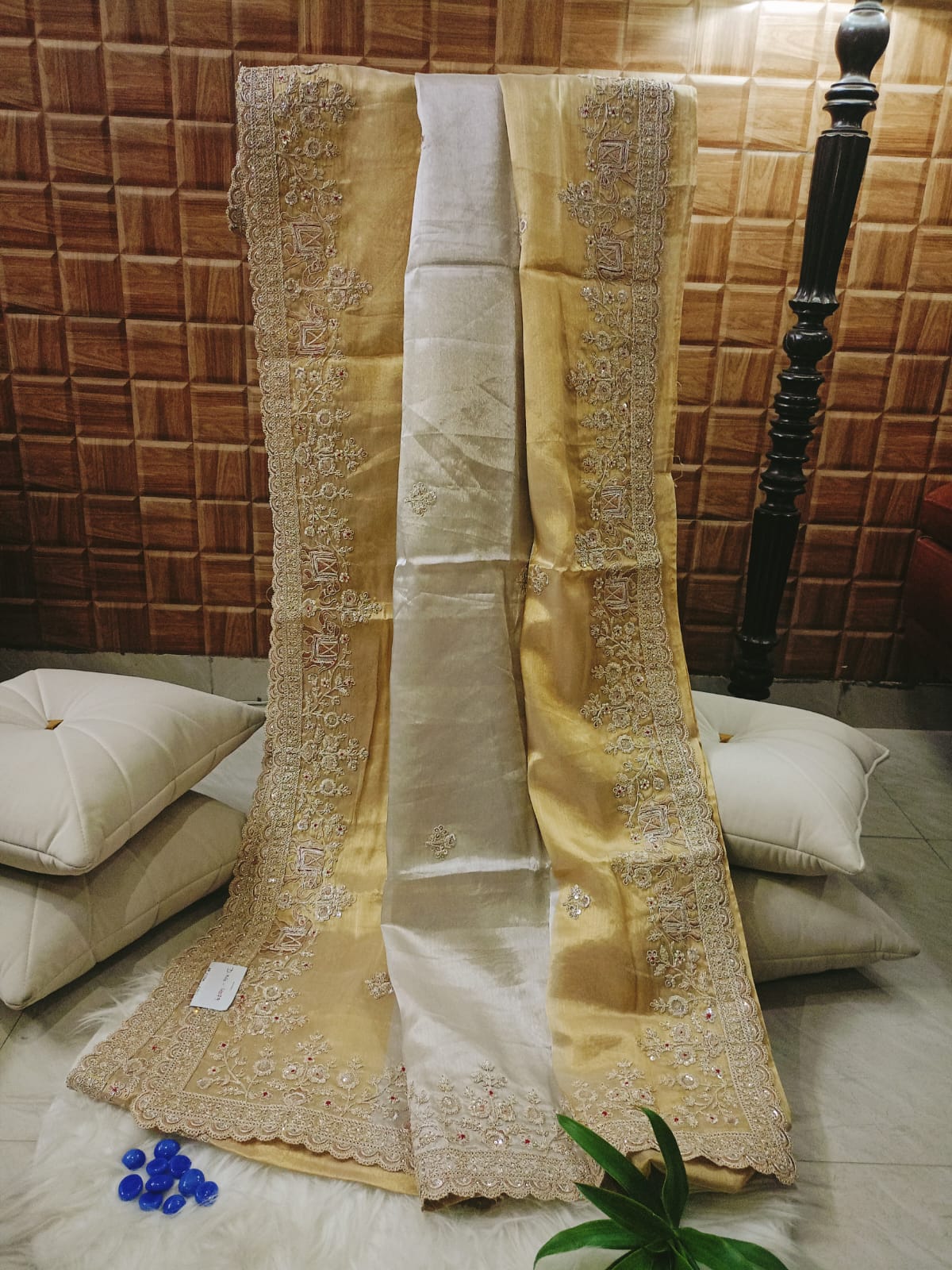 Gold Tissue Saree Featuring Intricate Hand Embellishment